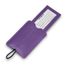 This fashionable vinyl tag is the perfect accessory for any bag. The slide sleeve is perfect for recording personal information and is sized to fit most business cards. Bright fashion colors allow case to be easily identified on luggage carousel. Durable elastic strap easily attaches to baggage and keeps ID securely fastened en route.# Pieces In Set: 2Manufacturer Warranty: 3 YearMeasurements: .2 Height/Inches, 4.3 Length/Inches, 2.8 Width/InchesWeight (lb.): 0.25 LbBase Material: 100% VinylCar… Classic Travel Card Holder With Id Window, Rectangular Card Holder With Id Window For Daily Use, Rfid Blocking Rectangular Badge Holder For Travel, Rectangular Rfid Blocking Badge Holders For Travel, Rectangular Rfid Blocking Badge Holders For Everyday Use, Functional Rectangular Travel Accessories With Card Slots, Everyday Rectangular Card Holder With Id Window, Purple Rectangular Travel Accessories, Modern Rectangular Luggage Tag For Travel