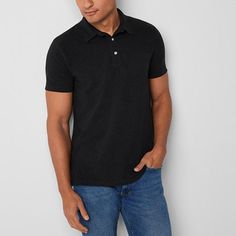 Deemed a Gotta-Have-It item for value you can count on every day! This men's polo shirt from mutual weave is tailored from a recycled stretch-cotton pique for a polished everyday look. Cut for a regular-fit, this short-sleeve button-down has a chest pocket. Wear yours with jeans or chinos.Closure Type: ButtonFit: Regular FitNeckline: Collar NeckPockets: 1 Chest Slip PocketSleeve Length: Short SleeveApparel Length: 28.5 Inches - FrontFiber Content: 60% Cotton, 40% Recycled PolyesterFabric Descrip Black Short Sleeve Polo Shirt With Pockets, Black Cotton Polo Shirt For Business Casual, Black Cotton Polo Shirt With Pockets, Casual Black Polo Shirt With Pockets, Polo Shirts, This Man, Men's Polo, Stretch Cotton, Everyday Look