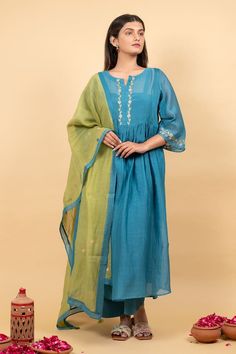 Teal blue anarkali with sequin, thread embroidery in floral pattern on placket and sleeve hem. Paired with flared pant, inner and contrast dupatta. - Aza Fashions Bollywood Style Long Sleeve Anarkali Set With Embroidered Border, Floor-length Chanderi Churidar With Embroidered Border, Floor-length Embroidered Chanderi Churidar, Floor-length Sets With Embroidered Border For Diwali, Blue Long Sleeve Cotton Anarkali Set, Blue Cotton Silk Salwar Kameez With Embroidered Border, Chanderi Salwar Kameez With Embroidered Border And Long Sleeves, Embroidered Cotton Silk Anarkali Set, Blue Cotton Silk Kurta With Embroidered Border