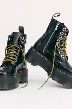 **Fit Note:** If in between whole sizes, we recommend sizing down.A super bold update to Dr. Martens' classic chunky Jadon boot, these towering chunk platform boots feature oversized eyelets and a medial zip with eye-catching striped laces.* Side zipper closure* Full-grain smooth leather with glossy finish* Goodyear Welt design, upper and sole are sewn together Dr Martens Jadon Max, Jadon Max, Jadon Boots, Dr Martens Jadon, Estilo Rock, Dr Martens Boots, Max Black, Chunky Boots, Goodyear Welt