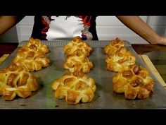 hot dog buns on a baking sheet ready to be baked