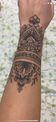 a woman's arm with a tattoo on it