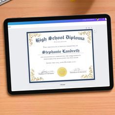 a tablet with a diploma certificate on it