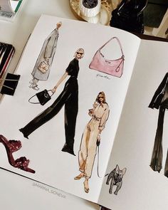 an open book with fashion illustrations on it