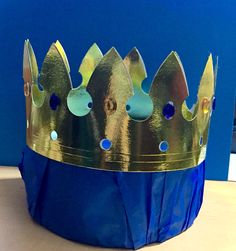 a paper crown sitting on top of a table