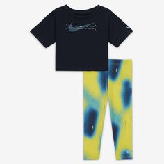 This 2-piece set is an easy way to dress little ones in coordinated Swoosh style. The tee is made of jersey knit fabric in a boxy cut that creates a cropped look while providing full coverage. The leggings are made of soft and stretchy jersey knit fabric enhanced with quick-drying, moisture-wicking Dri-FIT technology to keep kiddos comfy at play. Sporty Graphic Print Sets For Playwear, Sporty Playwear Set With Graphic Print, Sporty Graphic Print Playwear Set, Playful Blue Sets With Graphic Print, Nike Cotton Playtime Sets, Nike Cotton Athleisure Sets, Playful Nike Playwear Sets, Boxy Tee, Leggings Set