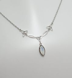 This is a new handmade necklace. It is made with antiqued silver plated Celtic knots, accented with a high quality WHITE OPAL glass jewel that sparkles like crystal. Decorated portion is 2 1/2" wide and 1 1/4" tall in the center. Necklace is adjustable 15-18" with a lobster clasp and chain extender. If you would like a different length, please send us a message.Matching earrings and headpiece are listed in our store in a variety of stone colors. If you don't see items with a color you want, feel Adjustable Oxidized Necklace For Weddings, Elf Necklace, Elven Necklace, Celtic Goddess, Celtic Necklace, Fun Clothes, Celtic Knots, Magical Jewelry, Filigree Pendant