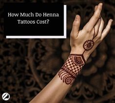 a woman's hand with henna on it and the words how much do henna tattoos cost?