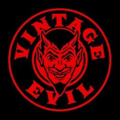 an evil devil logo on a black background