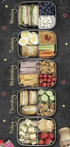 an open lunch box with sandwiches, fruit and crackers in it on a chalkboard background