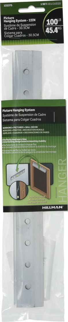 Hanging a heavy mirror, picture, or piece of home decor has never been easier than with this Hillman French cleat hanging system. This hanging system is designed to sit flush against wall and includes a level, so you can ensure a straight hang. Full package includes a level, mounting screws, anchors, and packaged instructions. Hillman 12-in Picture Hanging Cleat | 122375 Picture Hanging Tips, Bubble Levels, Mirror Picture, Hanging System, French Cleat, Wood Studs, Picture Hangers, Picture Hanging, Decorative Hardware