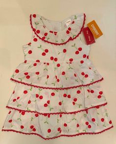 Gymboree Very Cherry Baby Girl White Sundress Red Cherry Print 2T 3T 4T NWT NWT from the Gymboree Very Cherry collection. Baby girls white 100% cotton sundress with red cherries print and delicate red crocheted trim. Collared sleeveless dress with 3 button closure in back. Available in Size 2T, 3T or 4T. Sizes 2T & 3T include a white diaper cover. Enjoy browsing my eBay store for more lovely items. Combined shipping is available. Thank you for taking the time to view my listing. In this eBay sto Cute Cotton Cherry Print Dresses, Cute Cotton Dresses With Cherry Print, Cute Cherry Print Cotton Dress, Red Cherry Print Dress For Spring, Spring Red Cherry Print Dresses, Red Cotton Dress With Cherry Print, Cherry Baby, White Sundress, Cotton Sundress