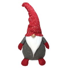 a stuffed toy with a red and white gnome hat on it's head,