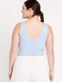 v-neck wide straps go-dry wicks moisture breathable fitted hits at natural waist provides light support for a-c cups models are approx.  5'9" and wear sizes s (4), l (12), and xl (18)machine wash according to the care instruction label Casual Sports Bra With Wide Straps, Compressive V-neck Top For Athleisure, Casual Activewear With Built-in Bra For Relaxation, Sporty Compressive V-neck Top, Casual Sports Bra With Stretch And Wide Straps, Casual Tank Top With Built-in Bra And Supportive Fit, Seamless Stretch V-neck Activewear, Compressive V-neck Workout Top, Casual Sleeveless Blue Sports Bra