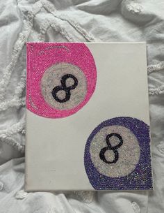 an image of a book with numbers on the front and back cover that is covered in sequins