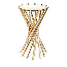 a gold and white side table with round glass top on an isolated white background for use in home decor