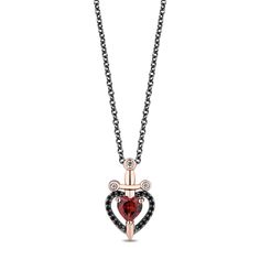 From the Enchanted Disney Fine Jewelry Villains Collection, this heart pendant necklace is inspired by the Evil Queen in 'Snow White and the Seven Dwarfs'. Crafted in black rhodium-plated sterling silver with 10k rose gold-plated accents, this pendant is reminiscent of the lock on the Evil Queen's frightening heart box and features the silhouette of a dagger top that seems to pierce a heart design. This heart is accented with treated black diamonds and a deeply hued garnet gemstone for an alluri Enchanted Disney, The Evil Queen, Enchanted Disney Fine Jewelry, Disney Fine Jewelry, Wedding Day Jewelry, Heart Box, Sirius Black, Evil Queen, Black Diamonds