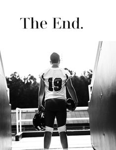 a football player is walking down the stairs with his helmet and mitt in hand