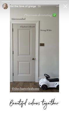 a white door with the words beautiful cedars together on it and a toy car in front