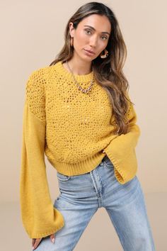 Getting compliments on your winter looks is easy with the Lulus Toasty Cuteness Mustard Yellow Cropped Crochet Sweater! Soft and stretchy sweater knit shapes long, flaring sleeves with drop shoulders and a crew neckline. Bodice boasts a chic crochet panel (with a sheer effect) at the front, and finishes at a cropped hem. Ribbed knit trims the neckline, cuffs, and hem. Fit: This garment fits true to size. Length: Size medium measures 18.5" from shoulder to hem. Bust: Great for any cup size. Waist Cropped Crochet Sweater, Boho Womens Clothing, Crochet Panel, Mustard Yellow Sweater, Yellow Knit Sweater, Chic Crochet, Pretty Orange, Sheer Clothing, Orange Sweater