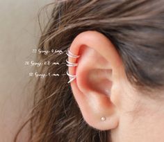 a woman's ear is shown with the measurements