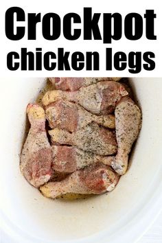 a close up of a plate of food with meat on it and the words crockpot chicken legs