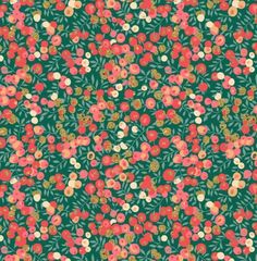 a green background with red and pink flowers on it's sides, all over the surface