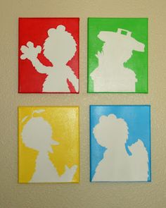 four different colored silhouettes of people on canvases