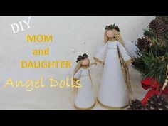 an angel doll next to pine cones and evergreen branches with the words diy mom and daughter angel dolls