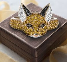 Introducing our enchanting Fox Face Ring, a perfect blend of whimsy and elegance that will captivate any animal lover's heart. This adorable Silver Origami Fox Ring captures the spirit of a playful fox in a sleek, modern design. Handcrafted from high-quality sterling silver, this unique hip hop ring is not only a stylish accessory but also a meaningful piece of art. Whether you're treating yourself or looking for the perfect gift for an animal lover, this silver fox ring is sure to impress. Our Ring Origami, Silver Cat Ring, Fox Ring, Skull Wedding Ring, Mens Skull Rings, Hip Hop Rings, Face Ring, Animal Ring, Fox Face