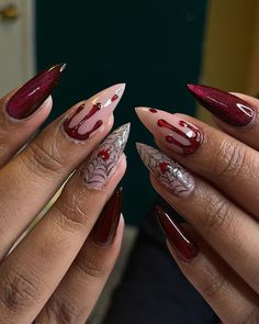 This dramatic design features deep burgundy nails with black spider web accents, creating a gothic and mysterious look. The combination of dark colors and intricate web designs makes this manicure perfect for the fall season.   Photo credit by: @geminailsbybeca Feline Energy, Burgundy Nail Art, Fall Almond Nails, Nail Strengthening, Vampire Nails, Spring Manicure, Horror Nails, Witchy Nails, Velvet Nails