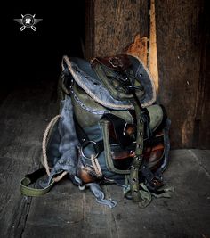 A backpack in a rugged, distressed style featuring post-apocalyptic elements. Made from khaki and gray genuine leather. Shaded using an airbrush and hand techniques. It has four exterior pockets and one interior pocket. An original design, one-of-a-kind piece. Dimensions: 34cm x 27cm x 10cm. Inktober Art, Handmade Leather Backpack, Leather Backpacks, Personal Style Inspiration, Vintage Backpacks, Gray Leather, Post Apocalyptic, Backpack Purse, Grey Leather