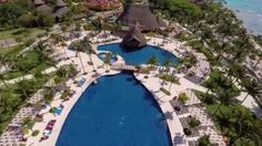 an aerial view of the resort and pool area