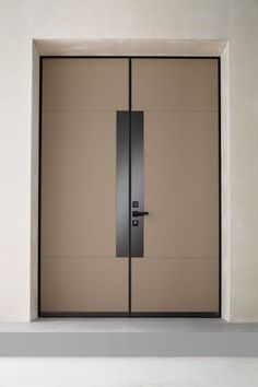 the door is open and there are two doors on each side, one with a black handle