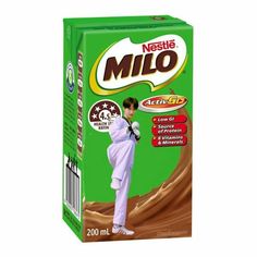 a carton of milk with a man in white clothes on it's side