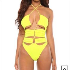 Yellow One-Piece Featuring A Unique Frontside Design With Adjustable Bust Strings And Neck Ties. Model Is Wearing A Size Xsmall True To Size Double Lined Swim Fabric- 86% Nylon, 14% Spandex Model Measurements: Bust: 32" Waist: 24" Hip: 36" Height: 5'7" Spring One-piece Cutout Swimwear, Spring Cutout One-piece Swimwear, Spring Beachwear Bodysuit With Cutout, Yellow Swimwear For Summer, Party Swimwear With Lined Body In Yellow, Yellow Bodysuit For Beach Season Parties, Summer Party Bodysuit With Cutout, Spring Party Bodysuit With Triangle Top, Yellow Party Bodysuit For Beach Season