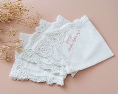 This personalized wedding handkerchief is the perfect gift for any bride and groom. Made of soft, high-quality cotton, this handkerchief can be embroidered with the couple's names and wedding date, making it a truly special and unique keepsake. The wedding handkerchief also makes a great gift for parents, grandparents, or any special person involved in the wedding. It's a timeless and elegant way to show them how much you appreciate their presence in your special day.This wedding handkerchief is Elegant Personalized Handkerchief For Bridesmaid Gift, Elegant Customizable Handkerchiefs For Bridesmaid Gift, Elegant Customizable Handkerchiefs For Personalized Gifts, Elegant White Handkerchiefs For Personalized Gift, Elegant Machine Embroidered Handkerchiefs For Gifts, White Wedding Handkerchiefs With Custom Embroidery, White Handkerchiefs With Custom Embroidery For Wedding, Customizable Elegant Handkerchiefs For Mother's Day, Elegant Customizable Handkerchiefs For Mother's Day