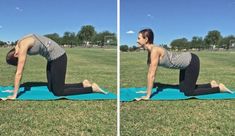 a woman doing yoga on a blue mat in the middle of a grassy field with trees behind her