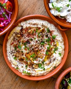 hummus and other foods are on the table