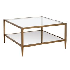 a glass and metal coffee table with two shelves on each side, against a white background