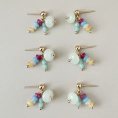 These mini tassels feature a combination of semi-precious beads and glass beads including jade and quartz. 18k gold plated, 316 Surgical Stainless Steel Pin Handcraft Earrings, Jeweled Bag, Beaded Things, Precious Beads, Mini Earrings, Semi Precious Beads, Jewelry Ideas, Jewelry Care, Shop Earrings