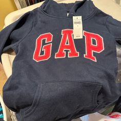 Nwt Girls Gap Sweatshirt Sporty Letter Print Tops By Gap, Sporty Letter Print Tops From Gap, Sporty Gap Tops With Letter Print, Gap Cotton Hooded Top, Gap Long Sleeve Top With Letter Print, Gap Sporty Long Sleeve Tops, Sporty Long Sleeve Tops By Gap, Gap Winter Tops With Letter Print, Gap Tops With Letter Print For Winter