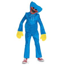 a child wearing a blue costume with a shark on it's face and yellow gloves