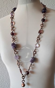 Vintage signed Dyrberg Kern necklace, copper metal links and polished stones in purple and clear cristals, finish with little metal charm with small crystals. It has a lobster clasp. Thi necklace in is very good condition, except missing a few /10 from 15/ small crystals from the charm/ see last photo/. long - 96 cm/ 37.8'' Purple Metal Jewelry With Natural Stones, Purple Jewelry With Natural Stones In Metal, Purple Jewelry With Natural Stones, Purple Metal Chain Necklace Gift, Purple Metal Chain Necklace As Gift, Purple Metal Costume Jewelry Necklaces, Small Crystals, Wedding Jewellery Necklace, Copper Metal