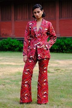 Red hand block print blazer with sequin, bead and thread embroidery. Paired with a matching printed trouser. - Aza Fashions Fitted Red Embellished Sets, Fitted Blazer For Festive Occasions, Fitted Blazer For Festive Occasions And Festivals, Fitted Red Blazer For Festive Occasions, Festive Fitted Blazer For Festivals, Traditional Fitted Red Blazer, Formal Red Sets With Printed Motifs, Red Fitted Sets With Mirror Work, Red Hand Embellished Fitted Sets