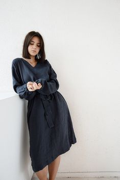 "Midnight blue V-neck long sleeve dress. Dress with pockets and long belt. Height of my model is 170 cm. / size - S IN PHOTO THE DRESS IS 43.3 \" / 110 cm long. --------------If you want a different length of the dress let me know.--------------- Choose size: XS Bust 82 - 84 cm. ( 32 1/4\" - 33\") Waist 66 - 68 cm. / (26\" - 26 3/4\") Hips 90 - 92 cm. / (35 1/2\" - 36 1/4\") dress length for this size is 110 cm/43.3\" S Bust 86 - 88 cm. ( 33 3/4\" - 34 3/4\") Waist 70 - 72 cm. / (27 3/4\" - 28 1 Midi Linen Dress, Midnight Blue Dress, Blue Dress Women, Marine Uniform, Long Linen Dress, Linen Clothing, Dress Linen, Dress Long Sleeve, Sweet Dress