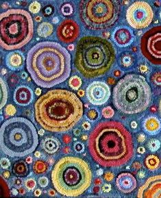 an image of a colorful rug with circles on it