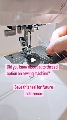 someone is using a sewing machine to sew something on the table with words below it