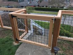 the gate is made from wood and wire