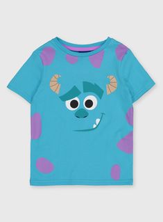 a blue t - shirt with an image of a cartoon character on the front and purple dots